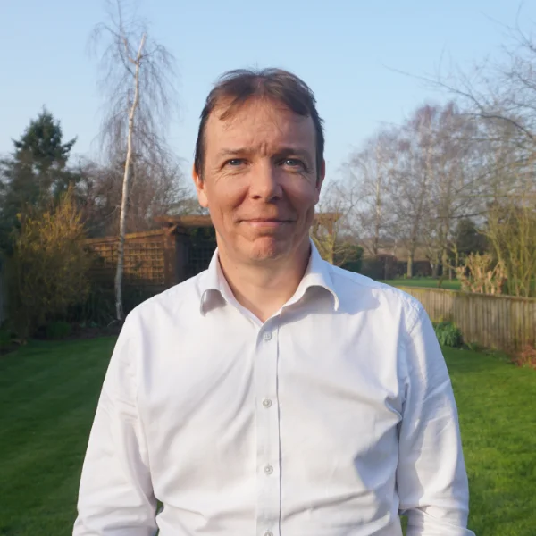 A photo of Kris Booth, chartered financial adviser, in a grassed area in Beverley, East Riding of Yorkshire.
